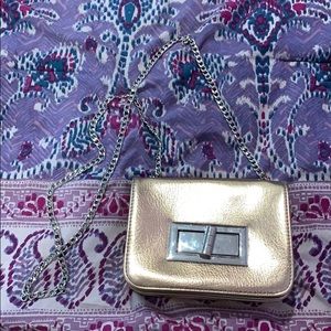 Free People rose gold metallic crossbody bag